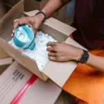 Mover packing fragile items carefully in Winnipeg